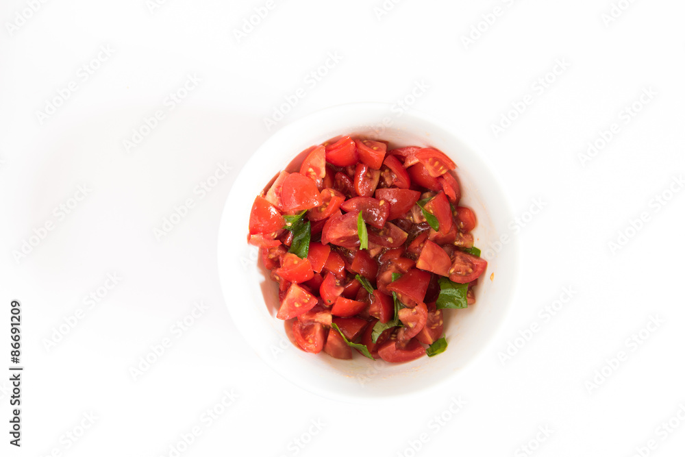 Smal bowl with tomatoes and basil Smal bowl with tomatoes and basil