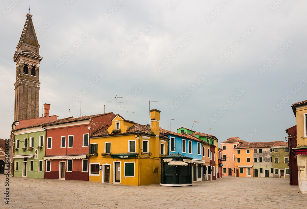 colorful houses on main square in Burano, Italy