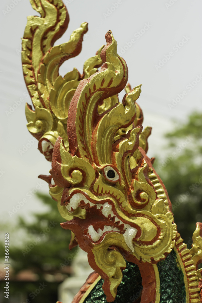 Fototapeta premium Ubonratchathani Thailand temple dragon statue on April 5, 2015
