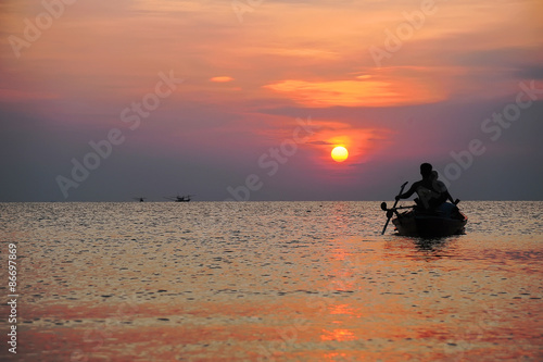 kayak at the sea on sunset