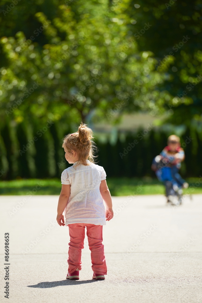 little girl have fun in park