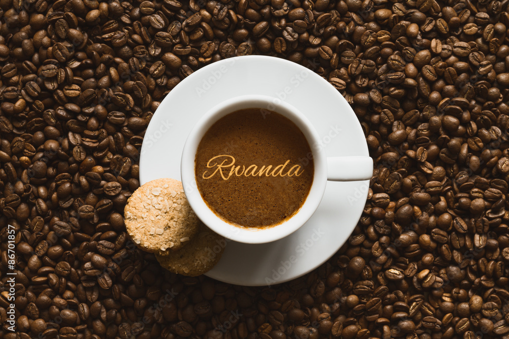 Naklejka premium Still life - coffee wtih text Rwanda