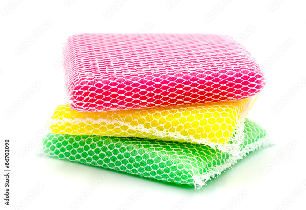 New colorful kitchen sponge on white background. New colorful kitchen sponge on white background.