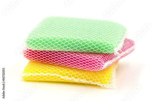 New colorful kitchen sponge on white background.