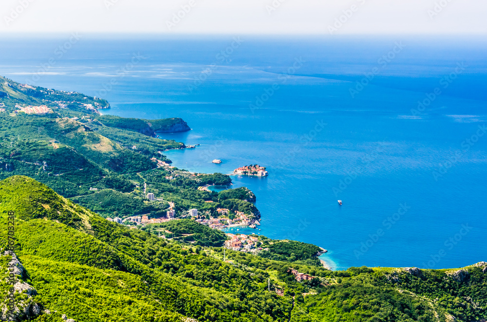 View on mountain, sea, and Sveti Stefan island, Montenegro