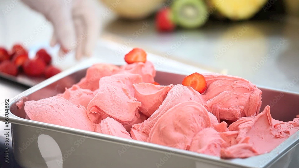 strawberry ice cream, professional hands garnish strawberry ice cream, professional hands garnish