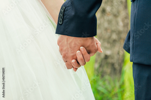 bride and groom to hold hands