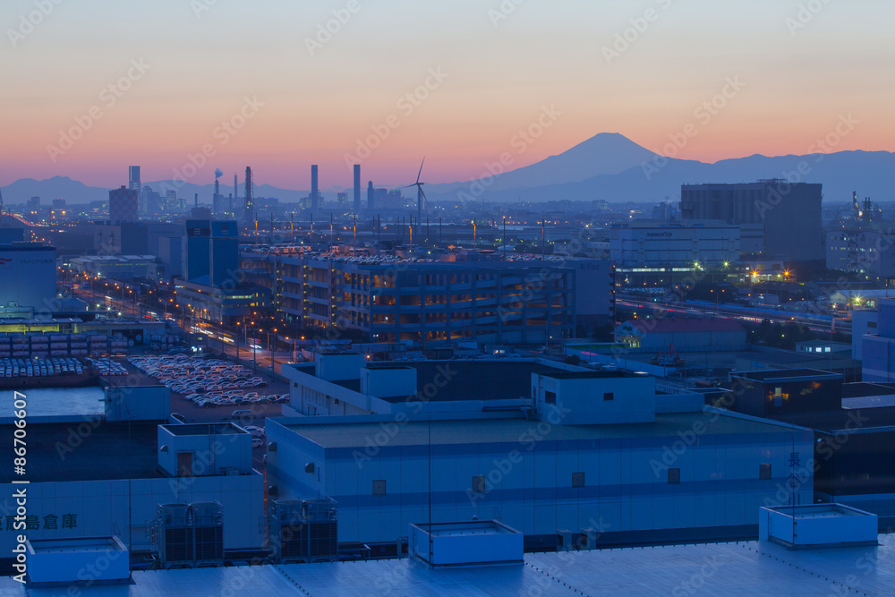 Mountain Fuji and Japan industry zone from Kawasaki city at twilight time.