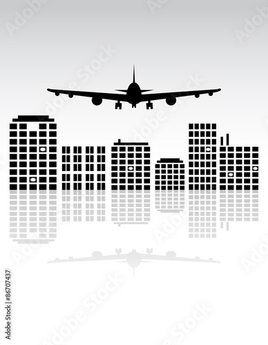 Plane flying over the city.