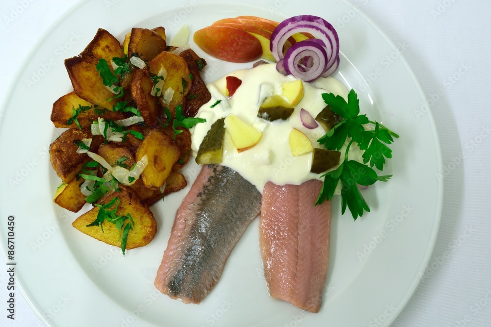 Matjes "Hausfrauen Art" mit Bratkartoffeln Stock Photo Adobe Stock