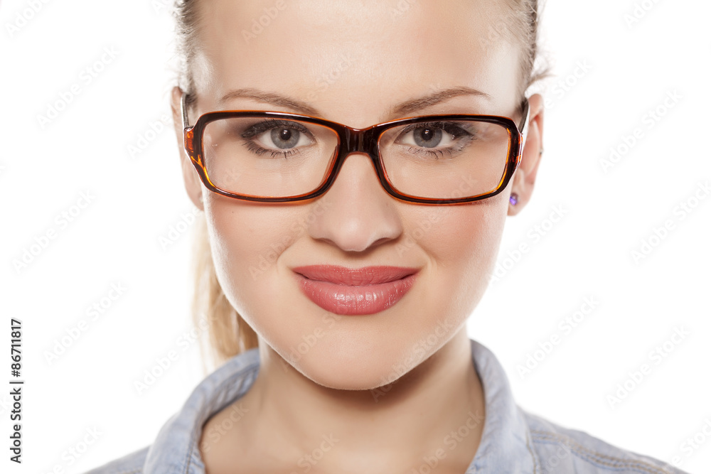 beautiful young blonde with glasses on a white background beautiful young blonde with glasses on a white background