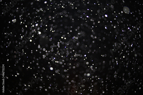 Abstract black white snow texture on black background for overlay © kichigin19
