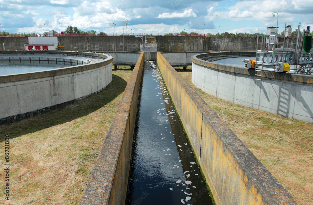 Fototapeta premium Channel with water from wastewater treatment plant
