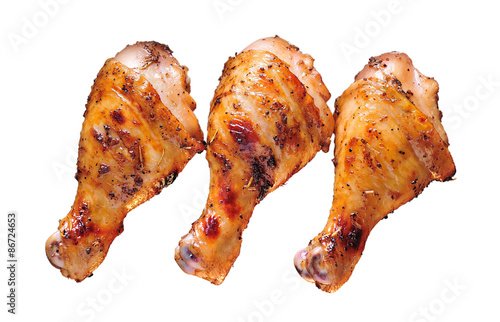 Grilled chicken leg on white background.