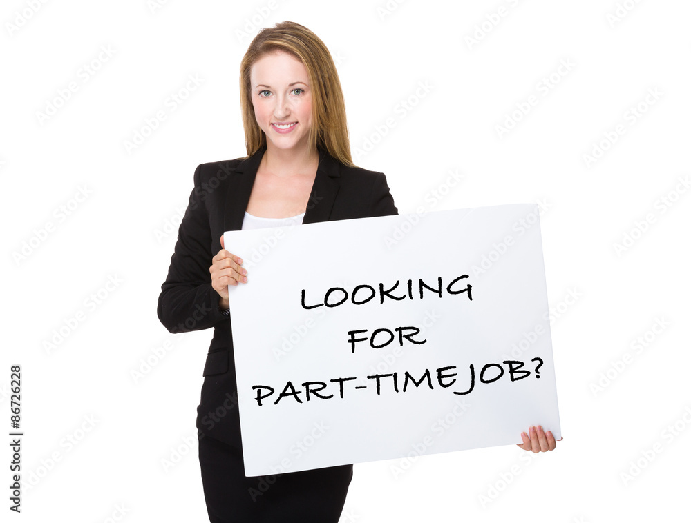 Businesswoman holding with a placard showing phrase of looking f Businesswoman holding with a placard showing phrase of looking f