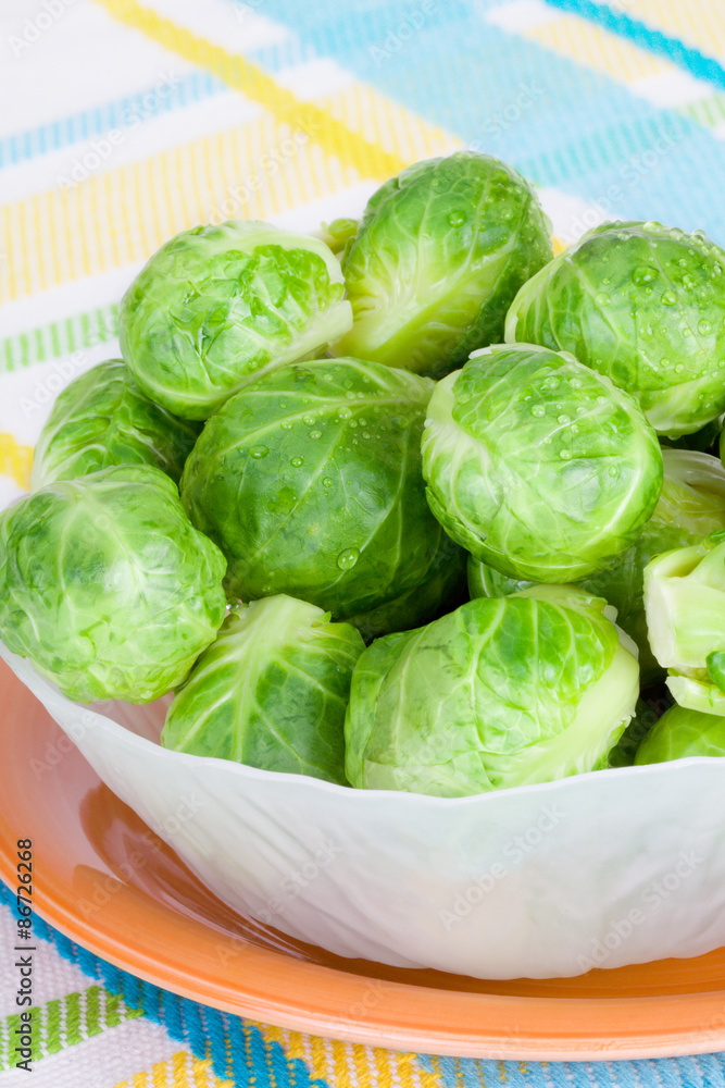 Brussel Sprouts in a Bowl – Freshly steamed whole brussel sprouts in a bowl.