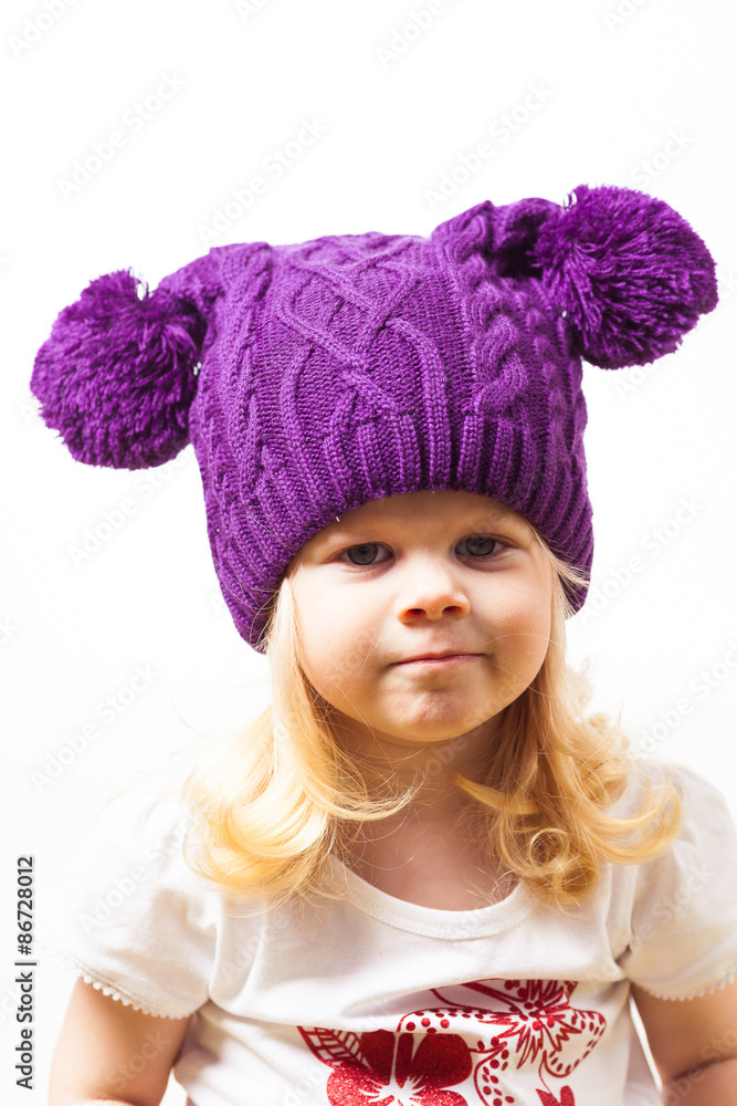 Nice little girl in knitted hat Nice little girl in knitted hat