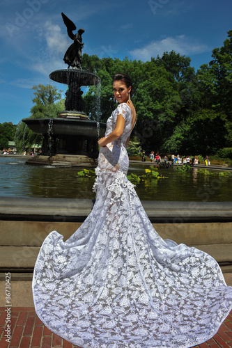 Model Kalyn Hemphill poses by the fountain in Central Park at the Irina Shabayeva SS 2016 Bridal collection photo shoot.