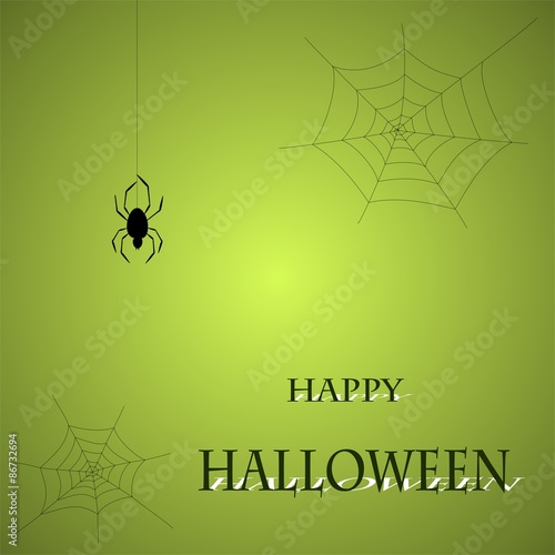 Halloween greeting with spider web and spider on a green background