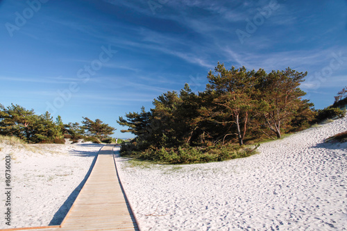 Steg und weißer Sandstrand auf Bornholm photo