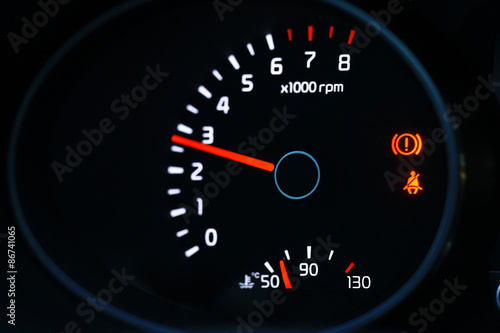 car dashboard speedometer tachometer macro