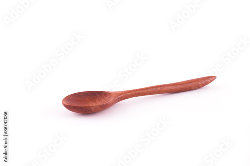 Wooden spoons isolated on white background.