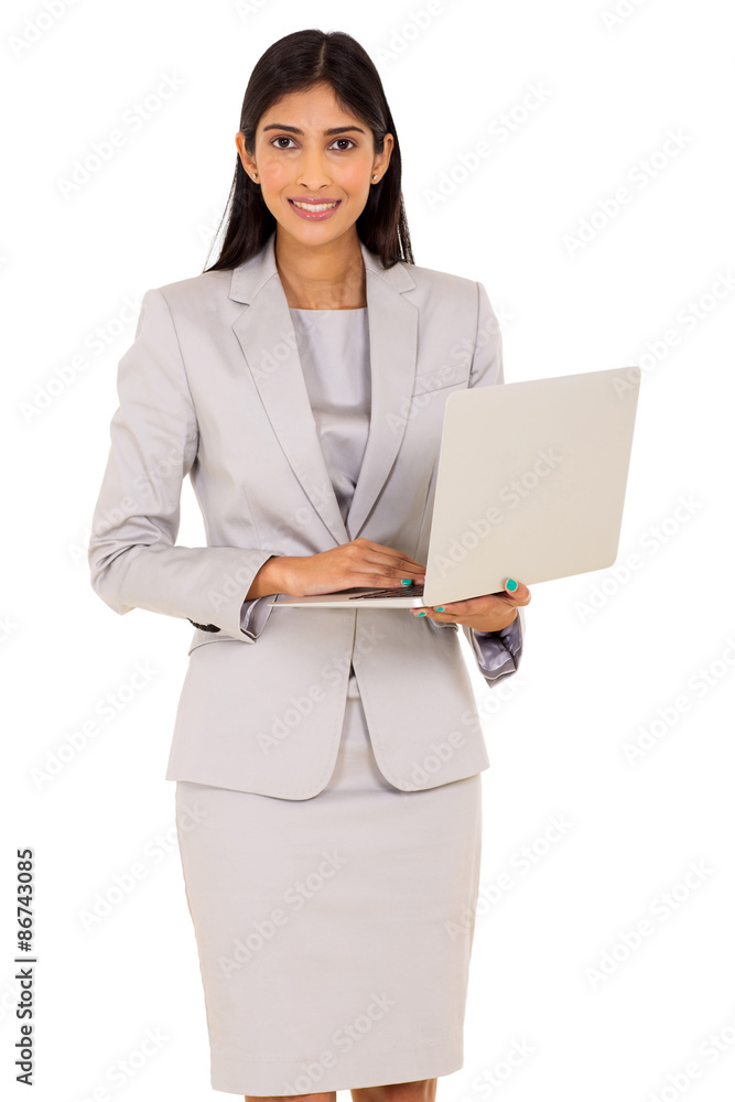 young indian corporate worker using laptop computer young indian corporate worker using laptop computer