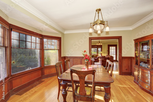Well put together dinning room with hardwood floor.