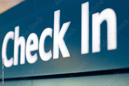 check in sign at airport