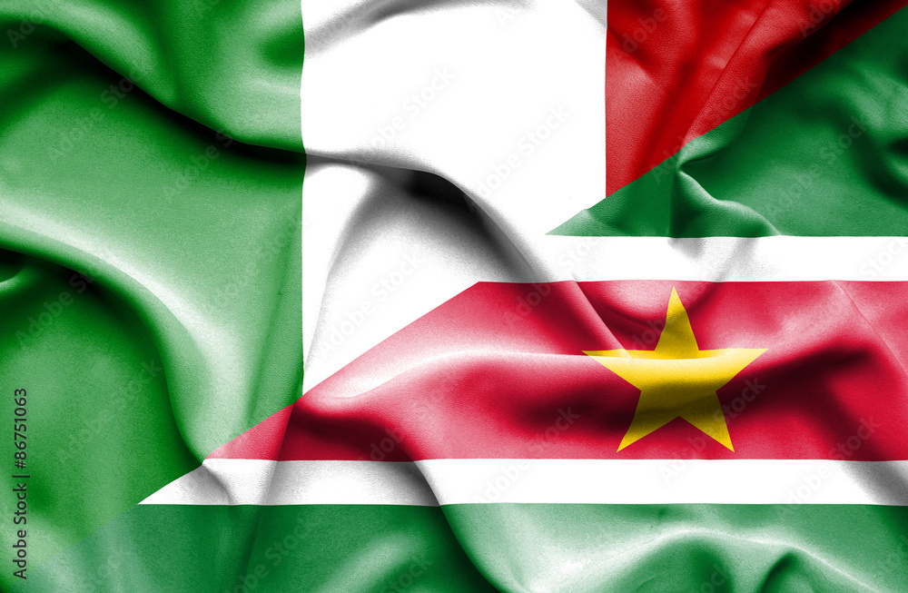 Obraz premium Waving flag of Suriname and Italy