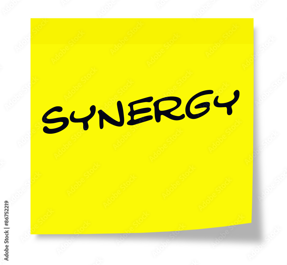Synergy written on a yellow sticky note Synergy written on a yellow sticky note