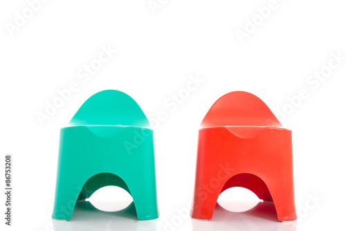 Small red plastic stools for kids