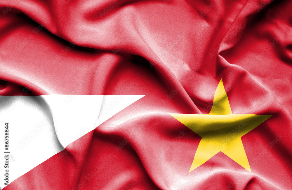 Waving flag of Vietnam and Monaco Waving flag of Vietnam and Monaco