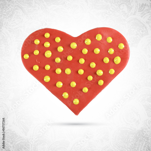 Play doh heart shaped valentine red cookie with yellow cream