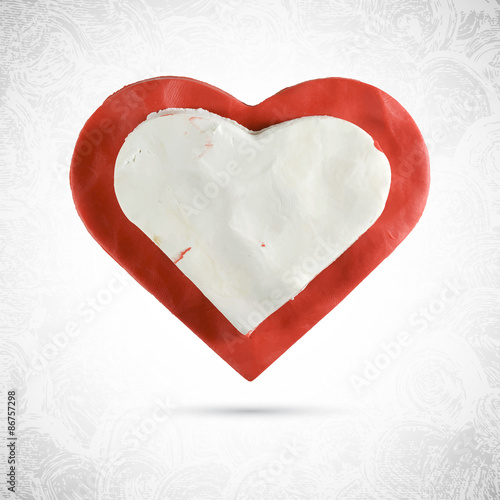 Heart, valentine red cookie with slice of white milk chocolate .