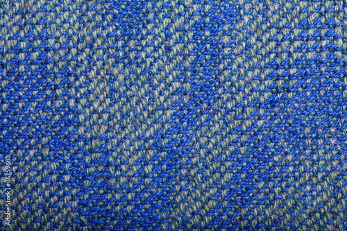 Handmade fabric with blue striped texture. Clothes background © Andrii Kozachenko