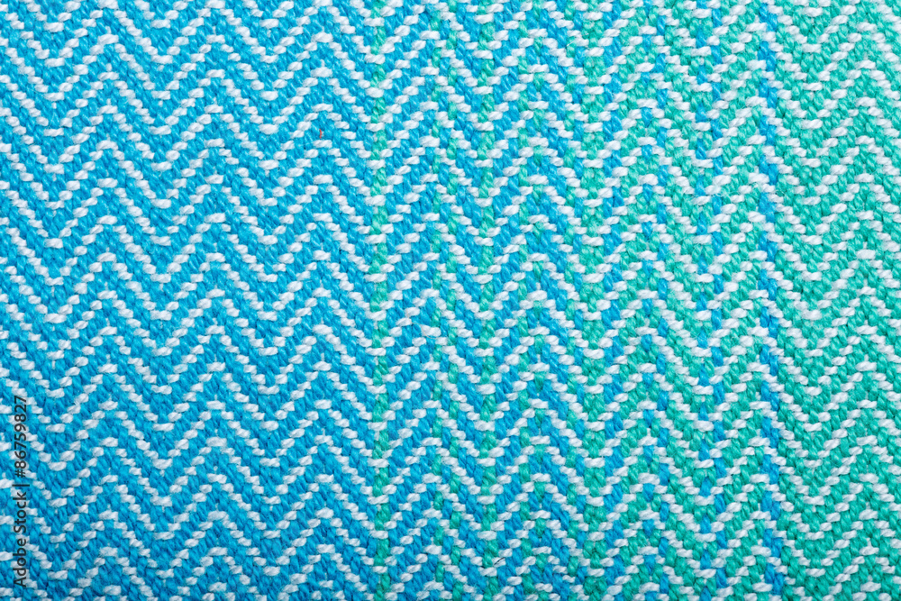 Handmade fabric with green striped texture. Clothes background Handmade fabric with green striped texture. Clothes background