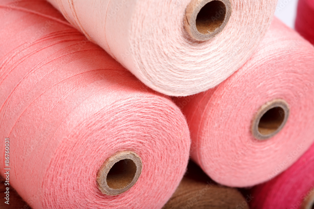 Sewing threads as a color background close up Sewing threads as a color background close up