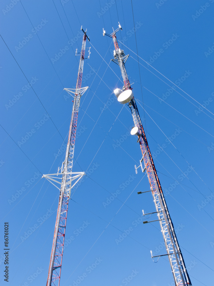 Two lattice telecommunication antenna towers