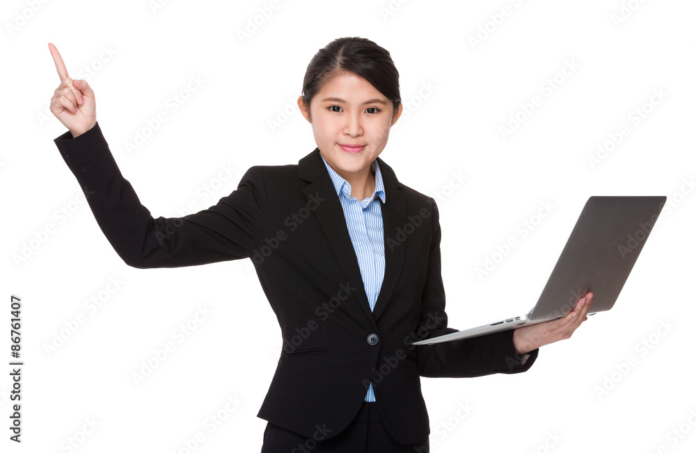 Businesswoman hold with laptop computer and finger point up Businesswoman hold with laptop computer and finger point up