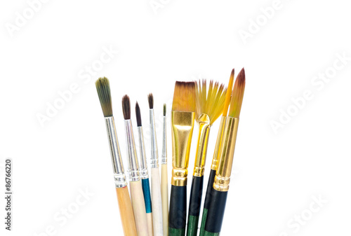 Paint brushes on white background