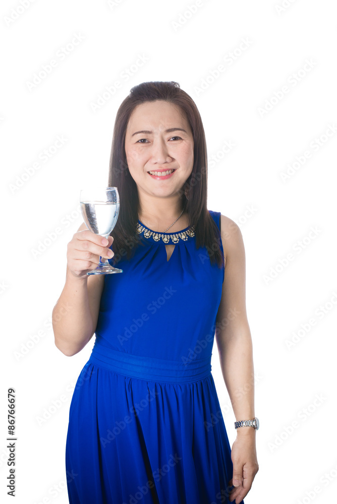Happy Asian woman with glass of water isolated on the white back Happy Asian woman with glass of water isolated on the white back