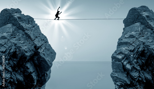 Man Balancing on the Rope High in the Sky photo