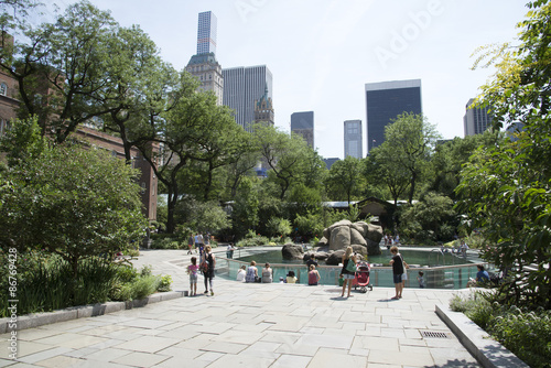 Visitors around the sea lions area at Central Park Zoo Manhattan New York USA
