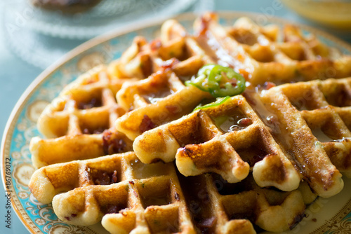 Gourmet breakfast and brunch setting with savory waffles, pancakes