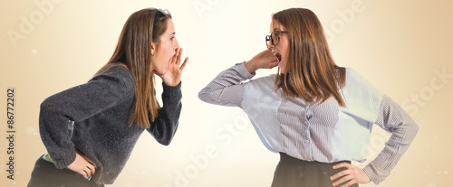 Quadro su tela One girl shouting and other listening