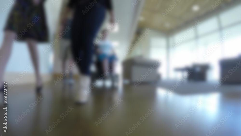 College students walking down a hallway College students walking down a hallway
