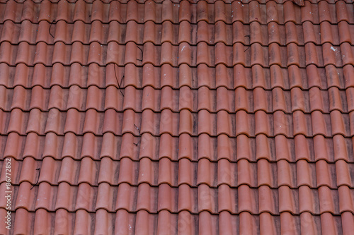 Old Red Tile Roof Needs Repair