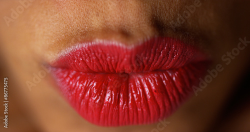 Obraz na plátně Closeup of woman pressing lips together