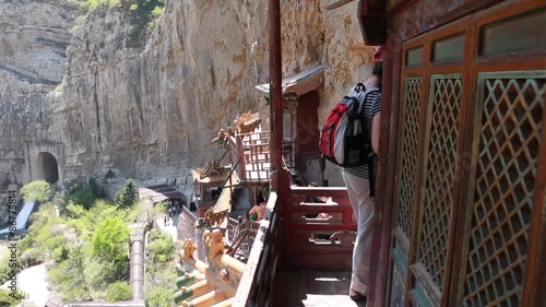 tourist visiting the hanging temple monastery in datong china